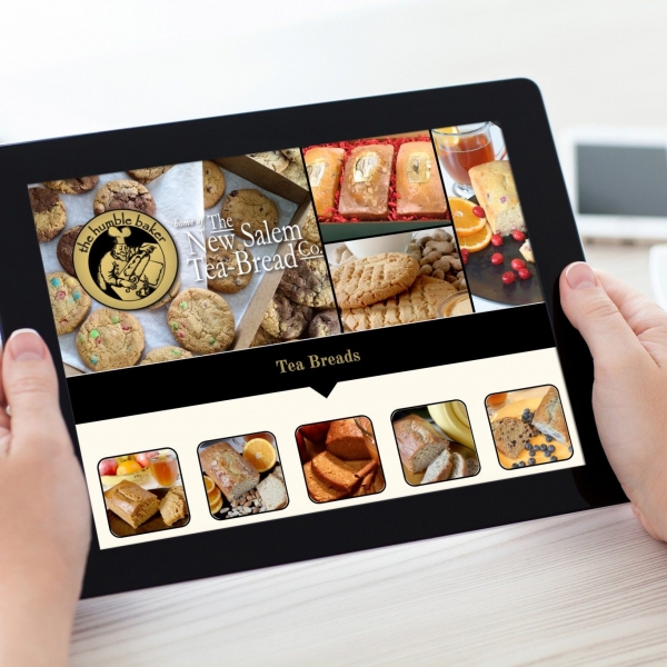 teabread_ipad-in-hand-mockup teabread_ipad-in-hand-mockup